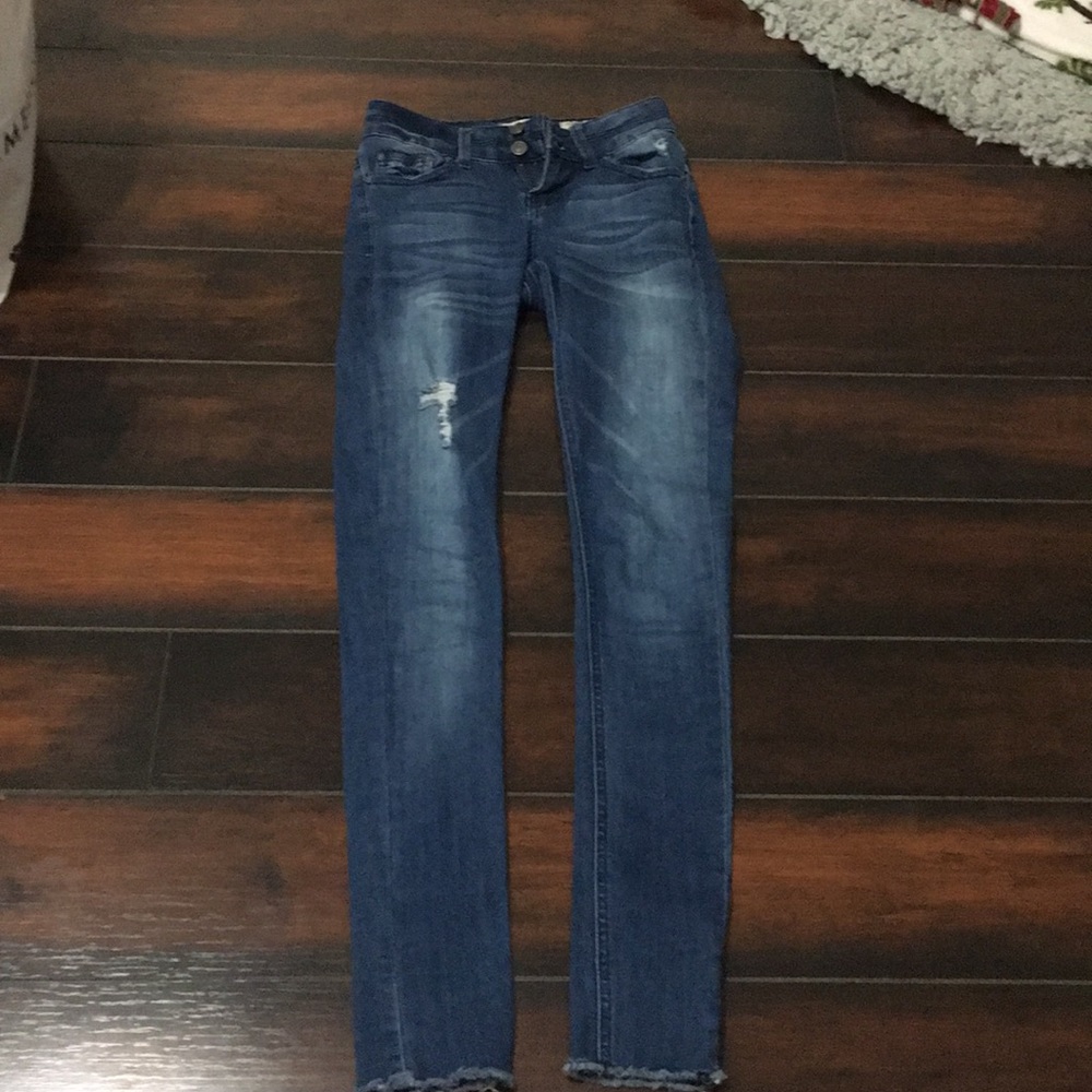Ripped blue jeans